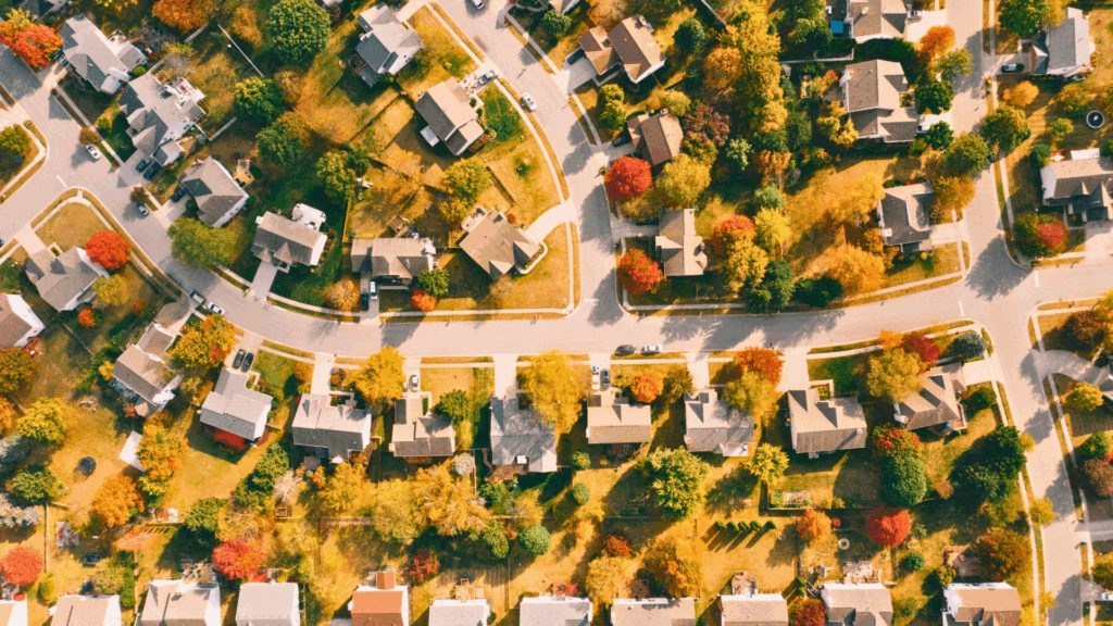 Aerial view of a neighborhood with fall trees, used for Puget Sound real estate blog about timing the market